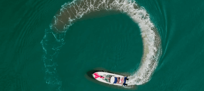 Sailing adventure in Goa's vibrant waters, showcasing the natural beauty of the coastline.